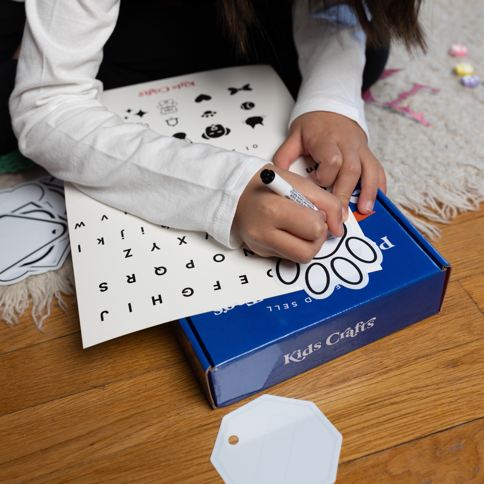 Kidpreneur Pet Tag Making Kit: An educational toy for children aged 8 and up, designed to teach business skills through a DIY pet tag craft. The kit includes materials for 20 customizable pet identification tags with shrink art acrylic, glitter, stickers, and gems. It features a Mighty Girl business plan, making it an ideal gift for young entrepreneurs and a hands-on learning experience for creative kids and pet lovers.